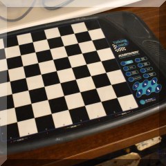 E23. Electronic chess set.